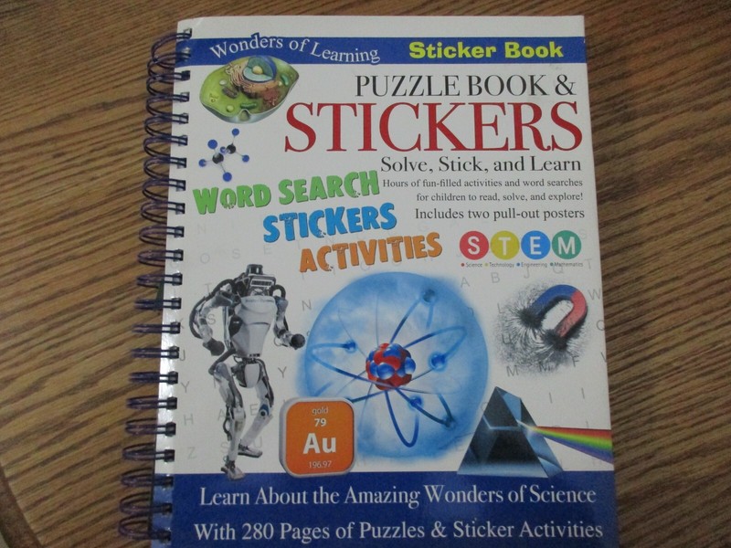 Puzzle Book & Stickers-Solve, Stick, and Learn (Wonders of Learning)