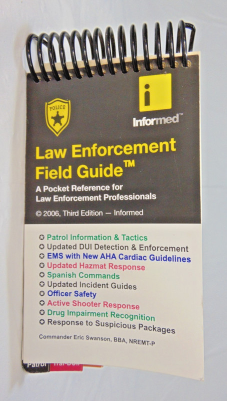 LAW ENFORCEMENT FIELD GUIDE By Informed & Eric Swanson Spiral pocket size
