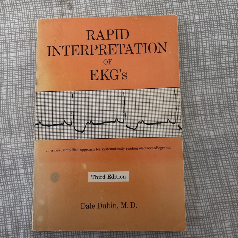 Rapid Interpretation of EKGs, third edition – Paperback – GOOD
